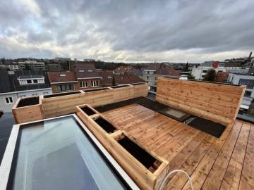 Réalisation d'une terrasse sur toiture avec bacs de plantation à Uccle